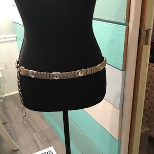 Women’s silver metal chain belt with square crystal charms.  32”